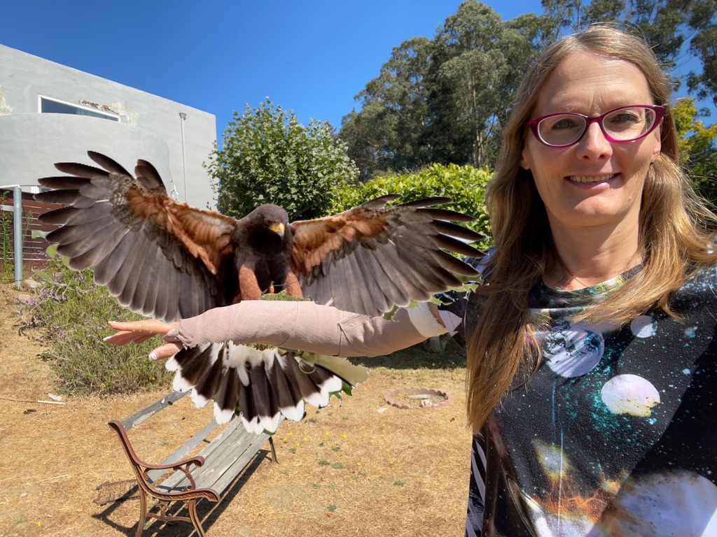 tracey with faked hawk on arm with half-cast