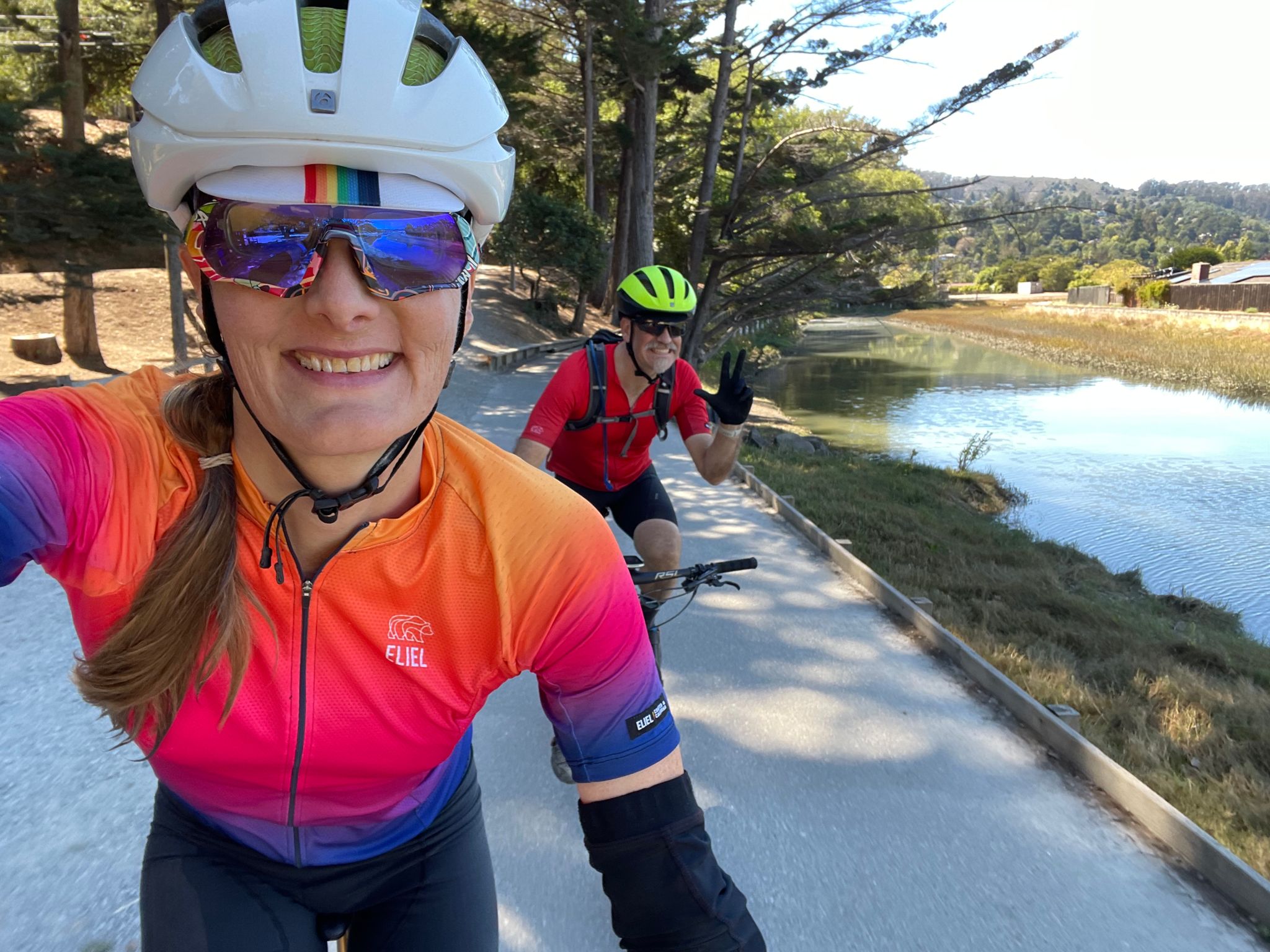 hunter and tracey biking next to a canal