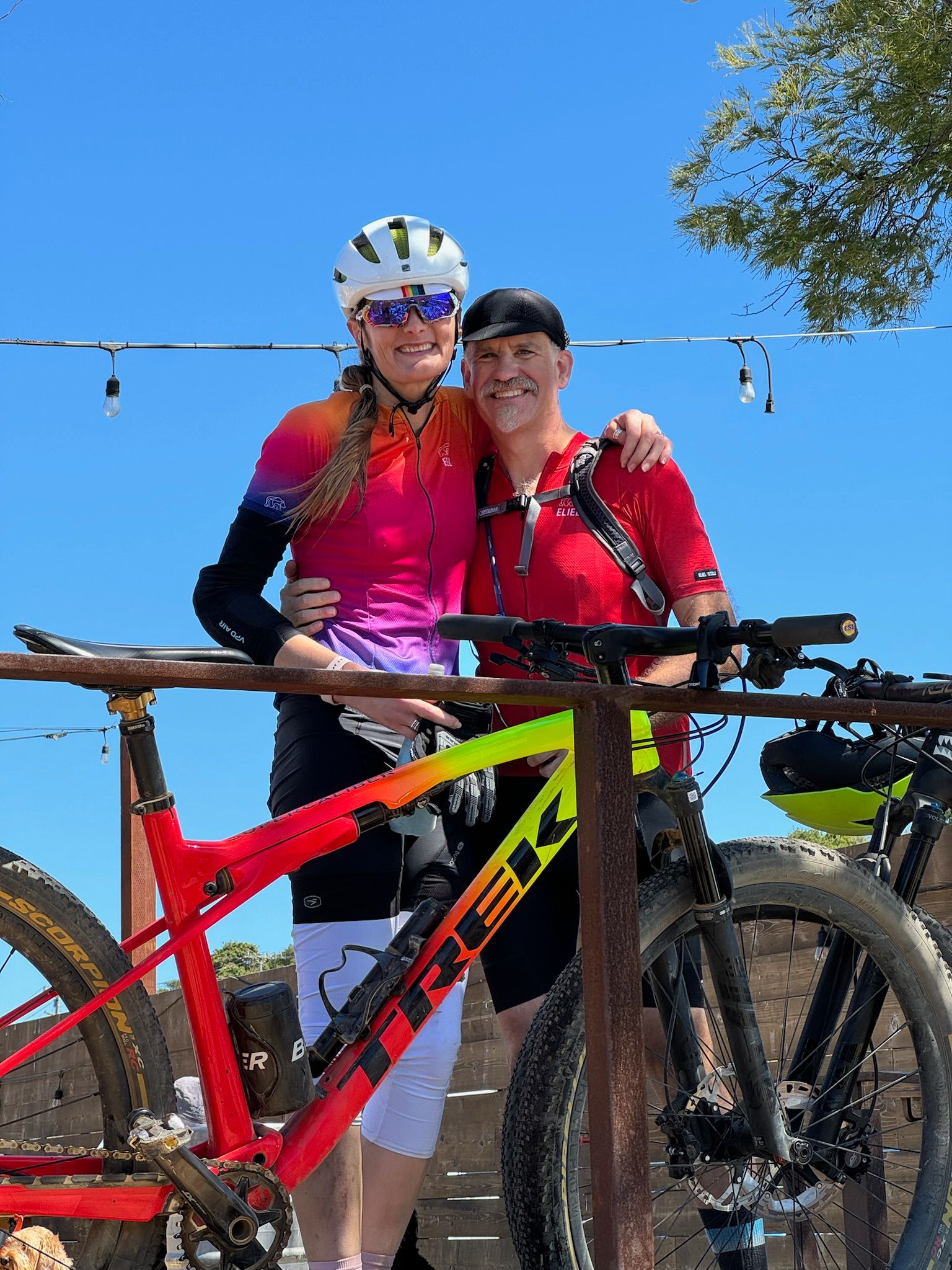 hunter and tracey hugging with her bike