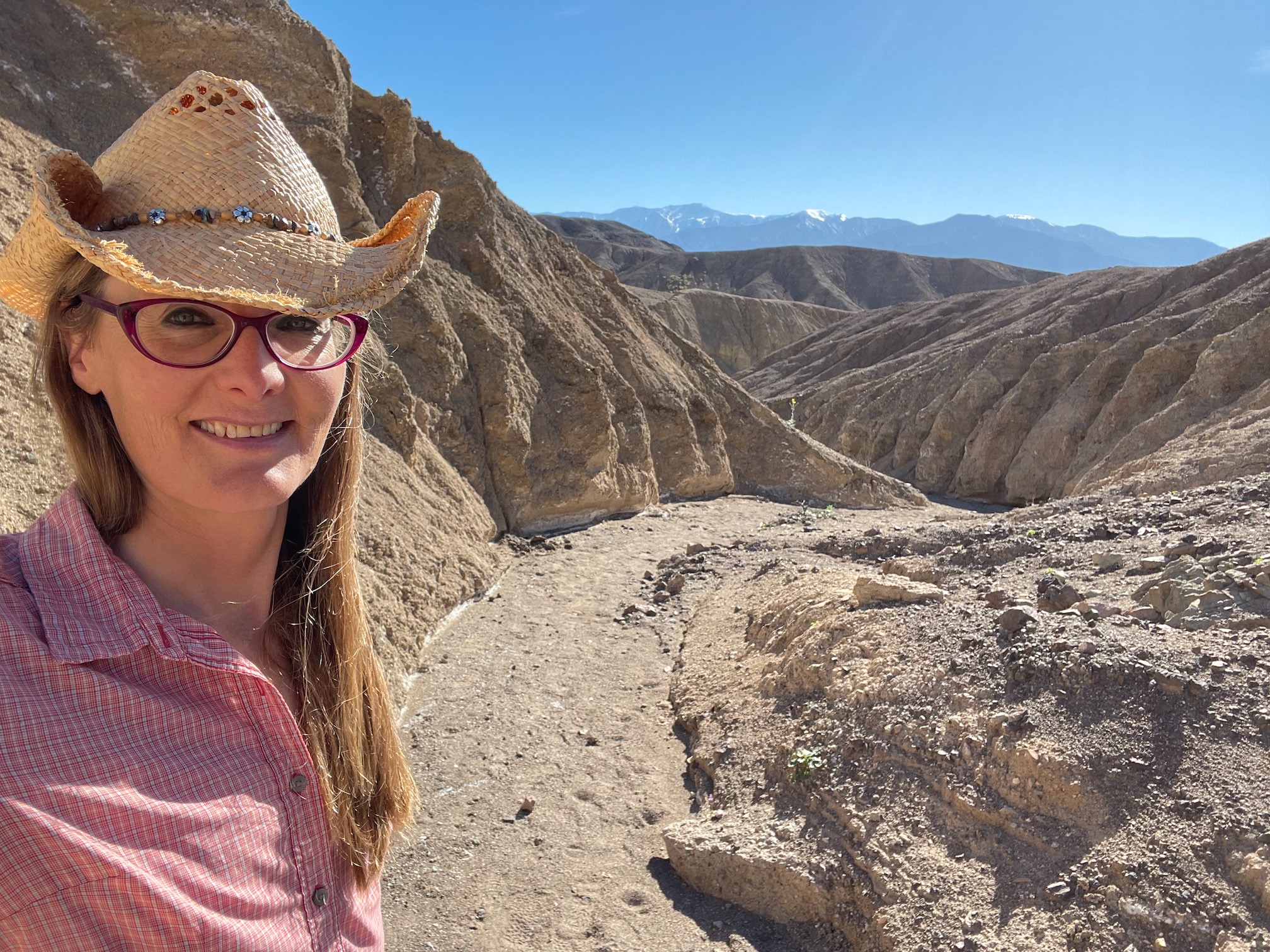 tracey in front of curved canyon path