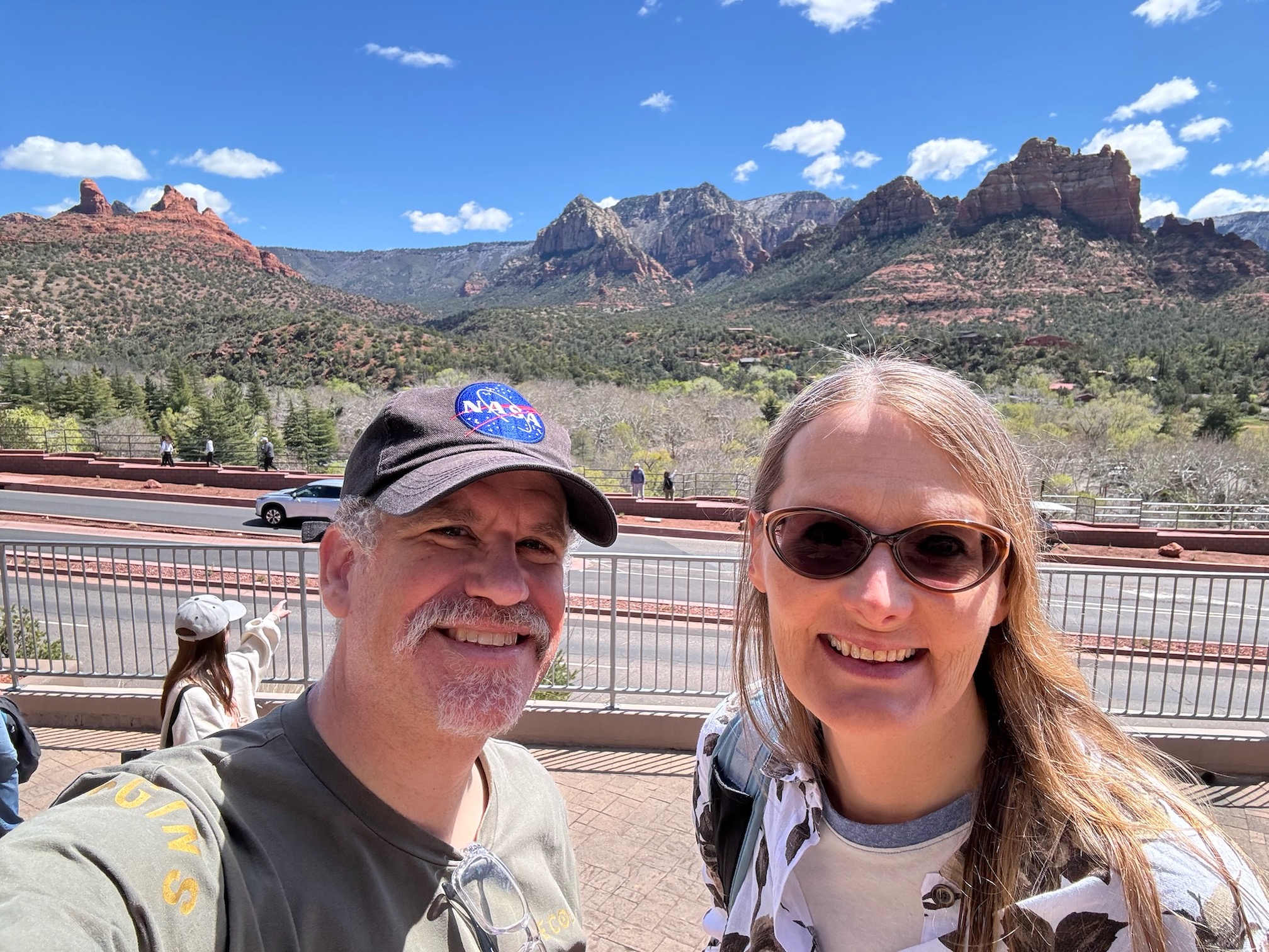 hunter & tracey in front of red rock buttes